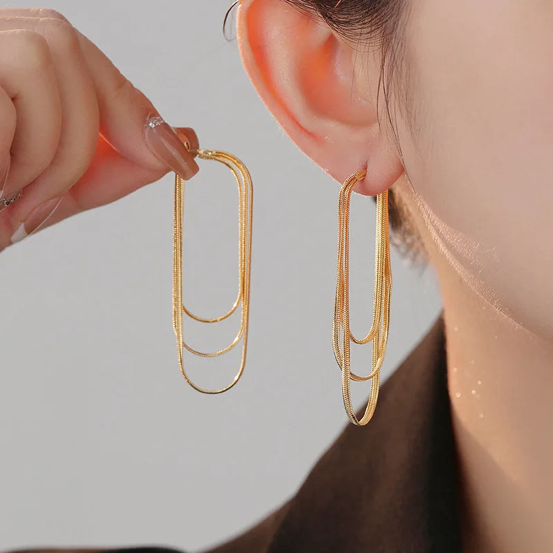 Arco Luxe | Boucles d'Oreilles en Couches Dorées et Argent Sophistiquées