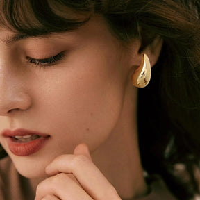 Gouttes d'Or | Boucles d'Oreilles Élégantes et Modernes