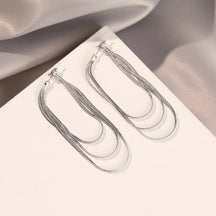 Arco Luxe | Boucles d'Oreilles en Couches Dorées et Argent Sophistiquées